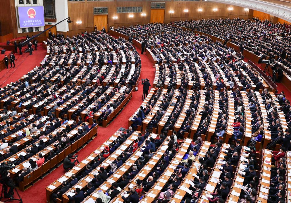 3月8日，十四屆全國人大二次會議在北京人民大會堂舉行第二次全體會議。新華社記者 劉續(xù) 攝