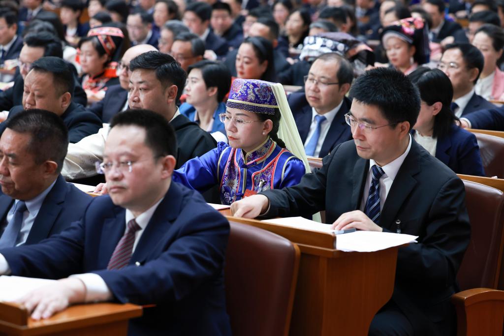 3月11日，第十四屆全國人民代表大會第二次會議在北京人民大會堂舉行閉幕會。新華社記者 王曄 攝