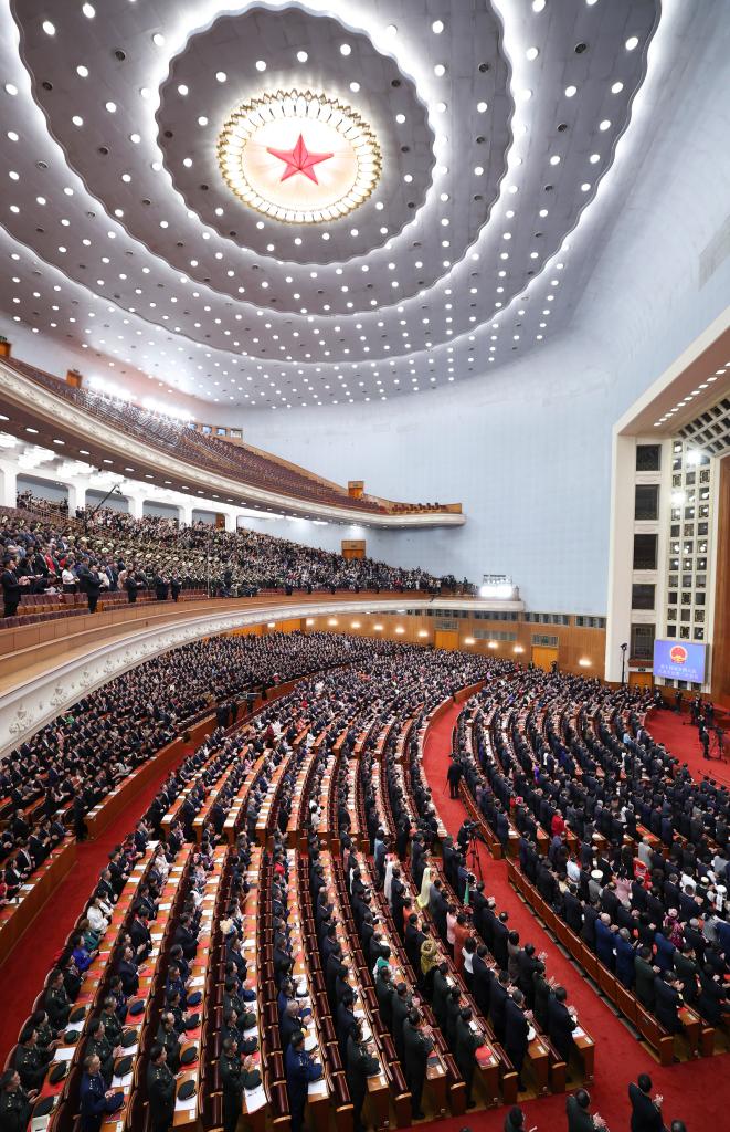 3月11日，第十四屆全國人民代表大會第二次會議在北京人民大會堂舉行閉幕會。新華社記者 丁林 攝