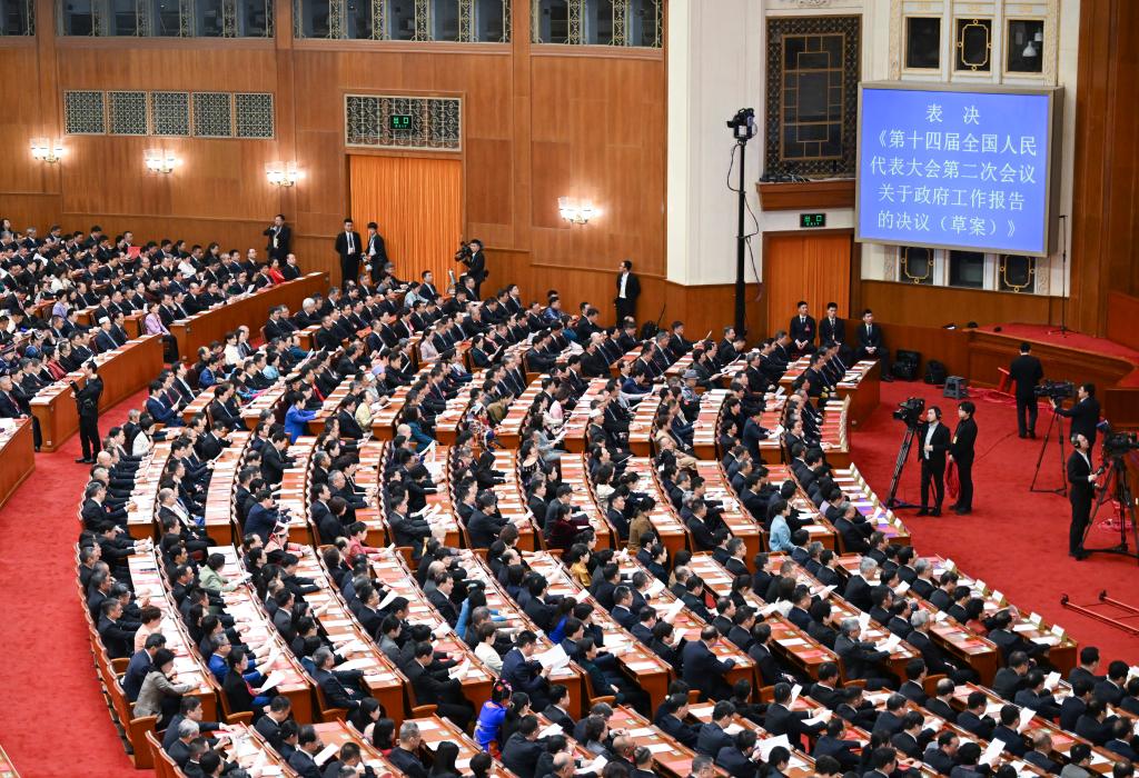 3月11日，第十四屆全國人民代表大會第二次會議在北京人民大會堂舉行閉幕會。新華社記者 牟宇 攝