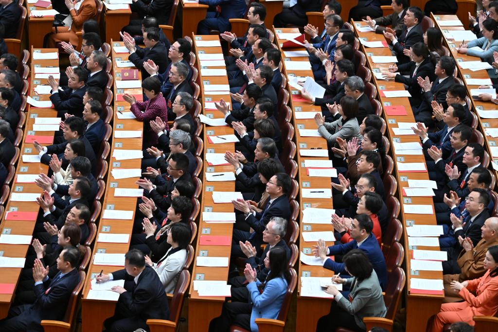 3月11日，第十四屆全國人民代表大會第二次會議在北京人民大會堂舉行閉幕會。新華社記者 李鑫 攝